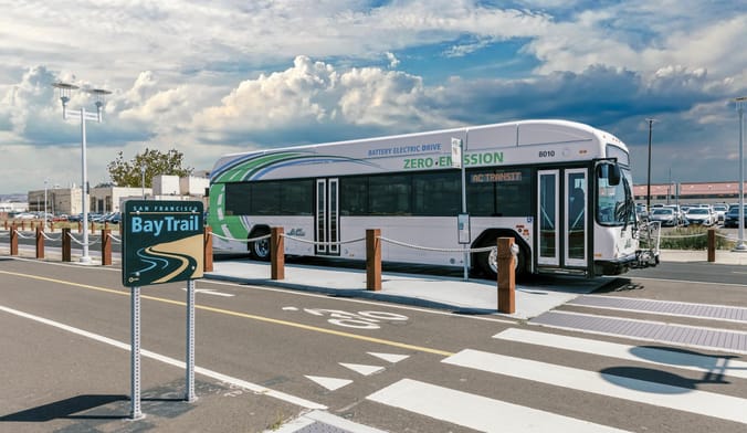 A large white public transit bus