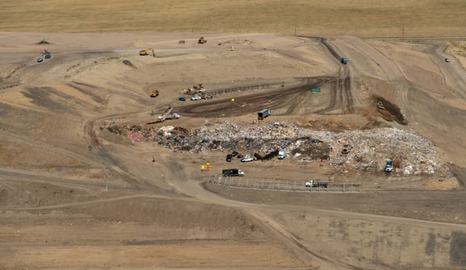 aerial view of landfill in the middle of a big plain