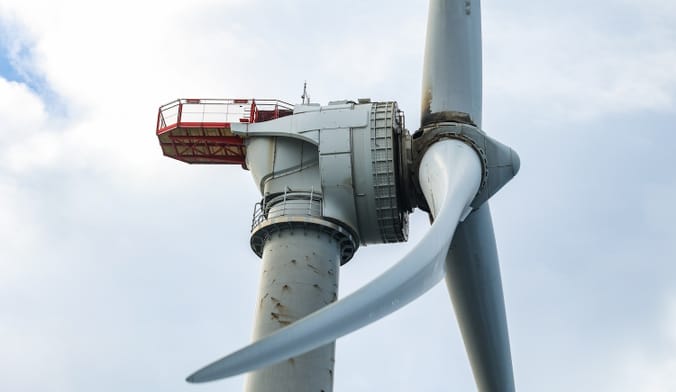 A close-up shot of an offshore wind turbine.