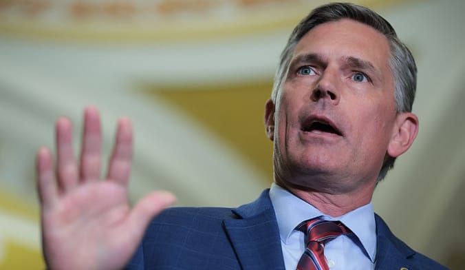 U.S. Sen. Martin Heinrich speaking with hand gesture