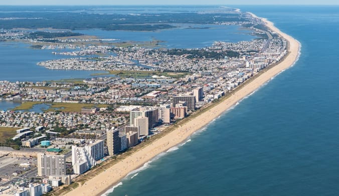 Aerial shot of coastal city and beach