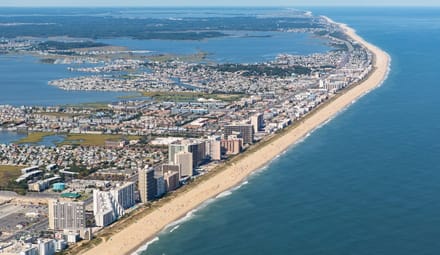 Aerial shot of coastal city and beach