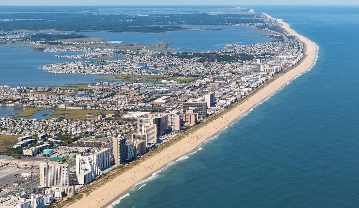 Aerial shot of coastal city and beach