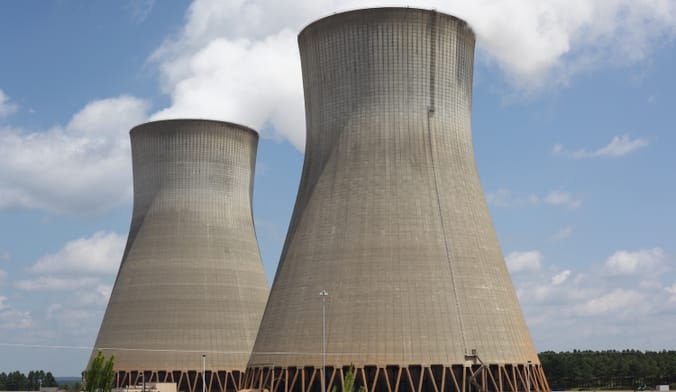 Two large industrial power plant structures