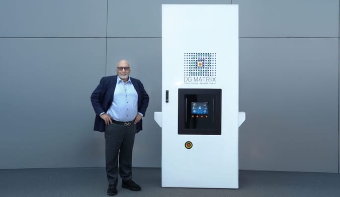 DG Matrix CEO Haroon Inam stands next to his company's new ﻿solid-state transformer technology, the multi-port Power Router