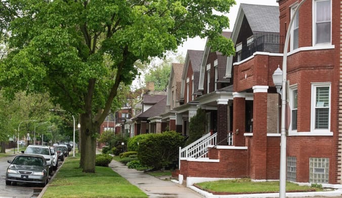A street lined with houses and trees