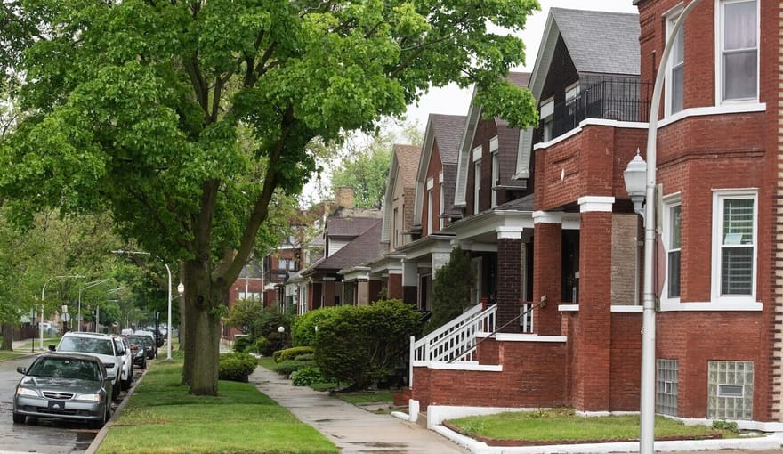 A street lined with houses and trees