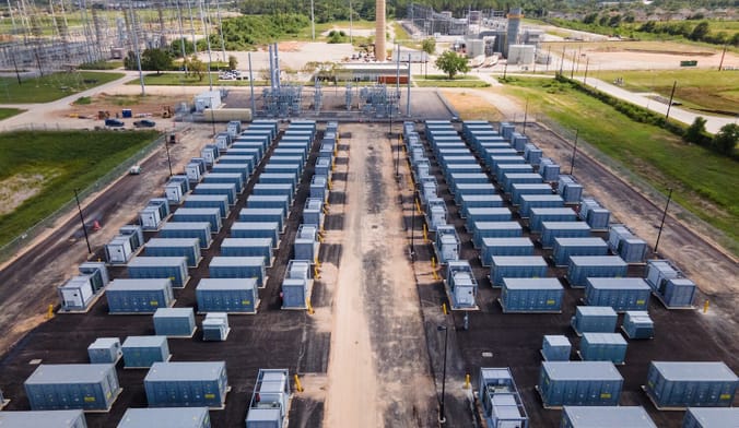 Aerial shot of rows of metal boxes in an industrial complex