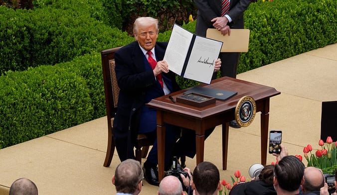 President Donald Trump signs tariffs executive order